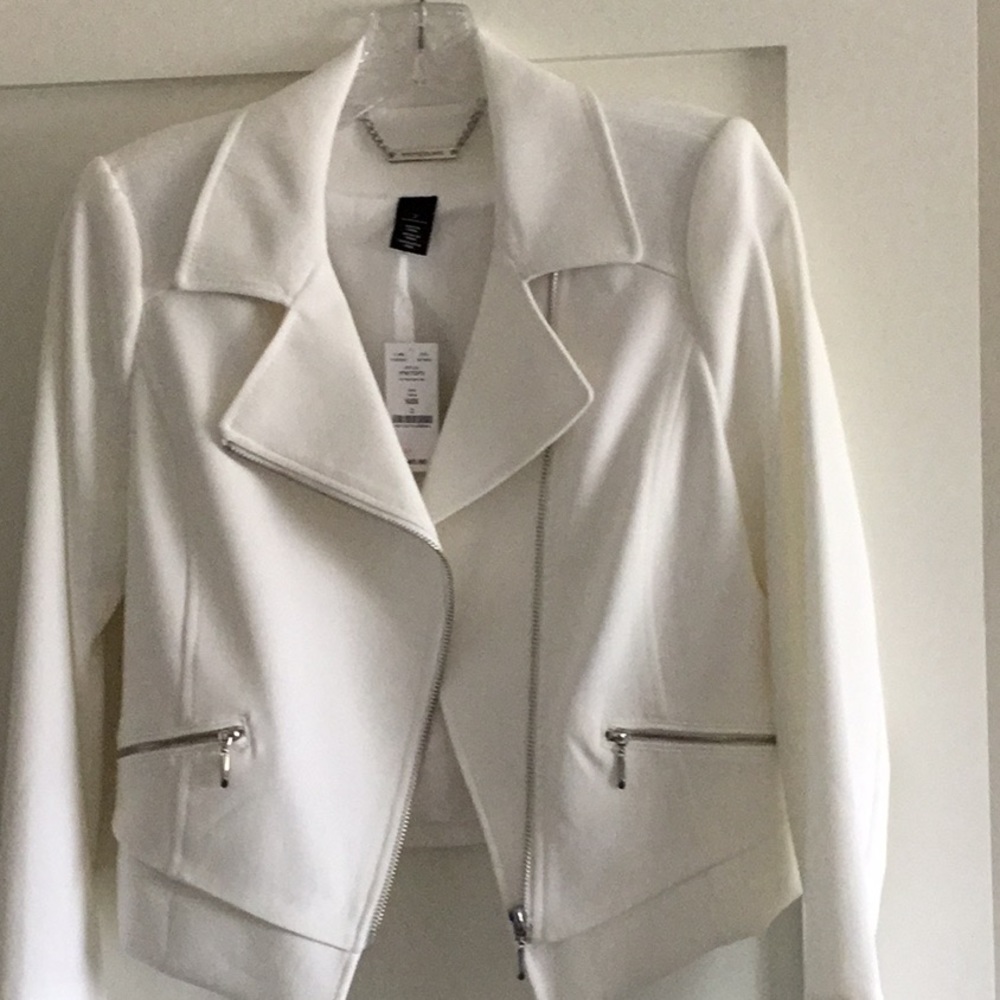 White House Black Market size 2 with silver zippers.  New tags still attached